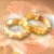 Couple Rings Gold Spinning HD Video Background 0445