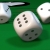 Dice Rotating on a Gaming Table HD Video Background 1184