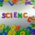 Hand Writes Science with Fridge Magnets