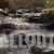 Slow Motion Pan Up of Mountain Stream with Stones, with Sound, Stock Footage