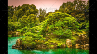 Magical Japanese buddhist temple garden with island in pond