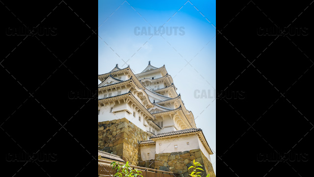 Himeji Castle, a hilltop Japanese castle by the city of Himeji, Hyōgo Prefecture, Japan. Low Angle.