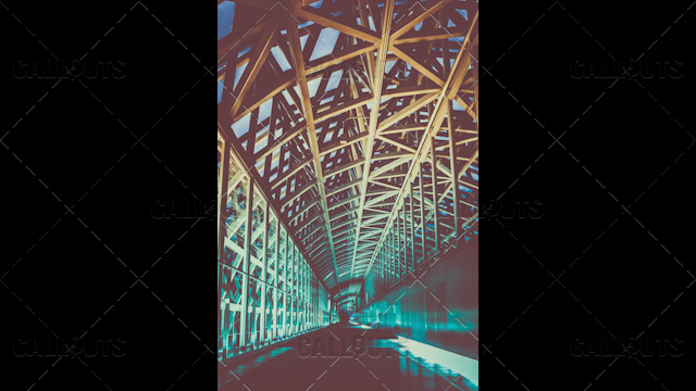 Kyoto Train Station metal construction walkway with roof. Portrait layout.