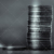 Two Stacks of Coins in Unfair Division Black and White