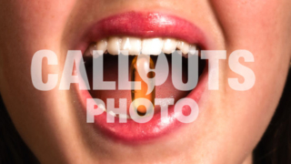 Closeup of Young Womans Mouth Biting Medicine or Supplement, Closeup of Mouth