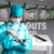 Young Medical Professional with Protective Gear, Holding Tablet, Emergency Ward Background