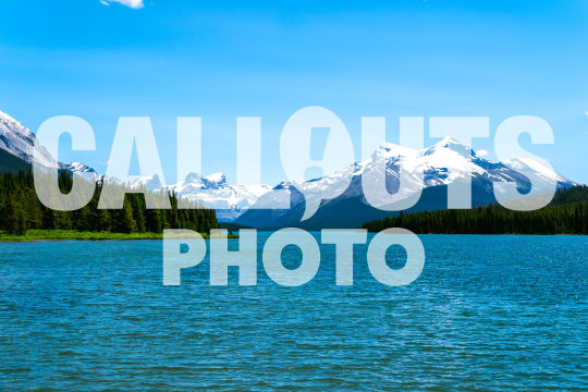 Maligne Lake with mountains and forest